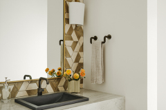 This bathroom features a floating vanity