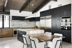 Grain matched Bleached walnut flat front. Walk in pantry by fridge. Island top